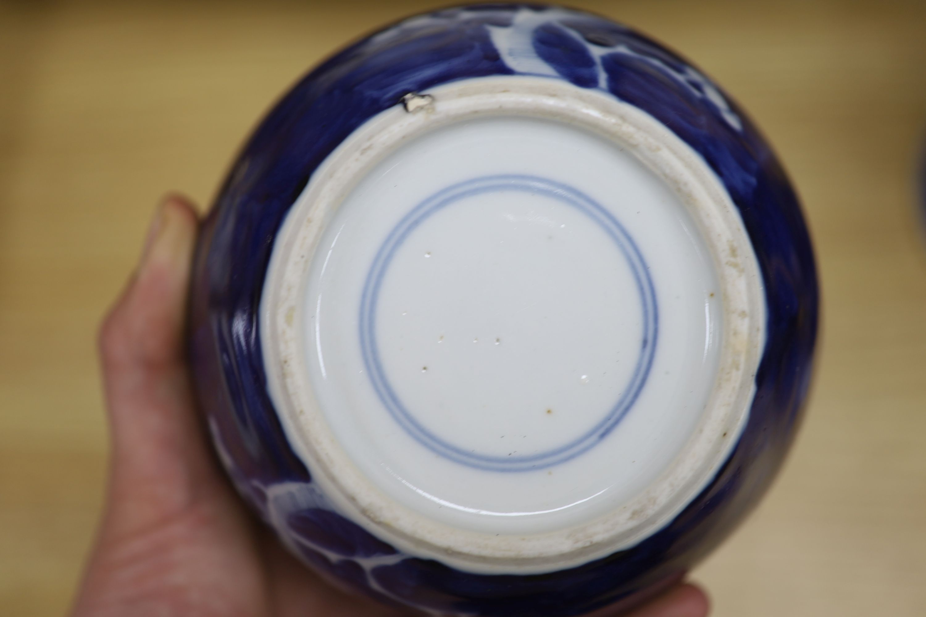 Two Chinese blue and white prunus pattern ginger jars and a similar cylinder vase, tallest 26cm